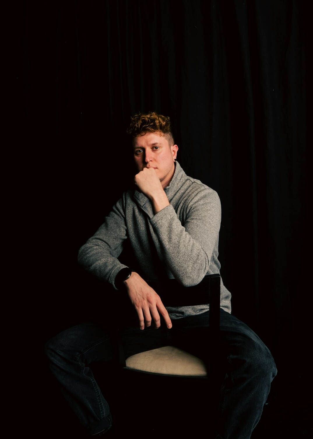 Studio portrait of a white Canadian man community journalist