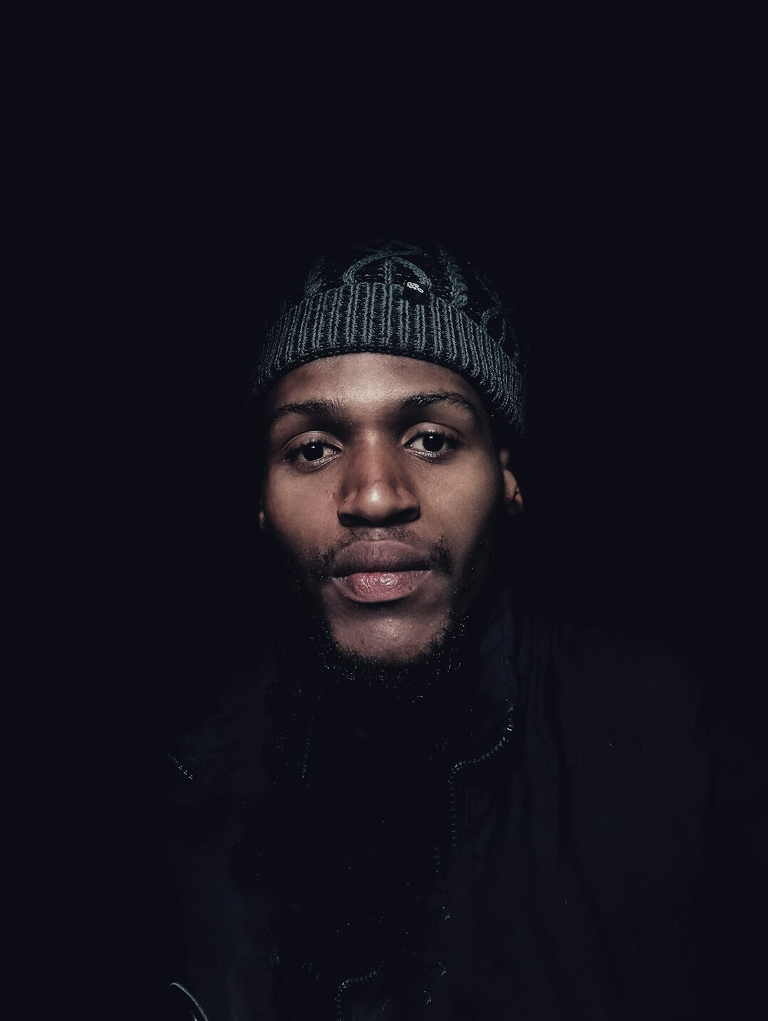 Studio portrait of a Black Canadian man photographer